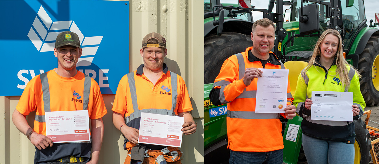 sw hire team members holding their certificates in front of john deere tractors